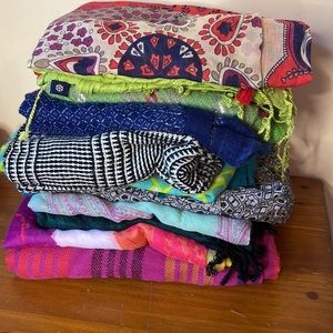 12 scarves (different colors, sizes, and styles)
